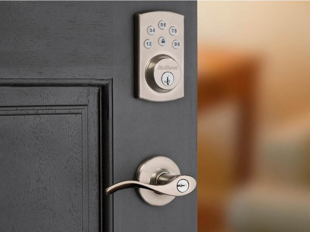 Powerbolt2 Satin Nickel Single Cylinder Electronic Deadbolt Featuring SmartKey Security and Balboa Passage Lever on black door