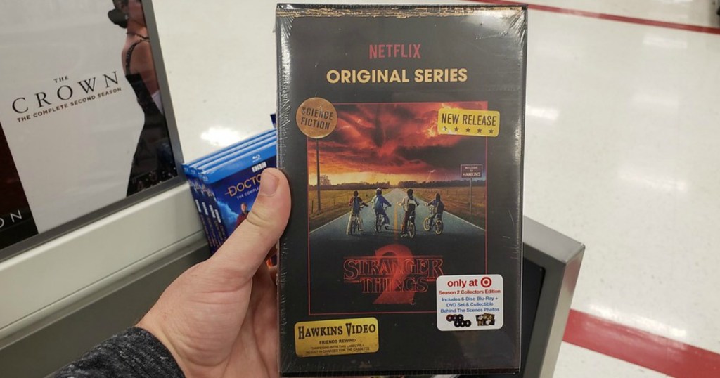 hand holding Stranger Things Season 2