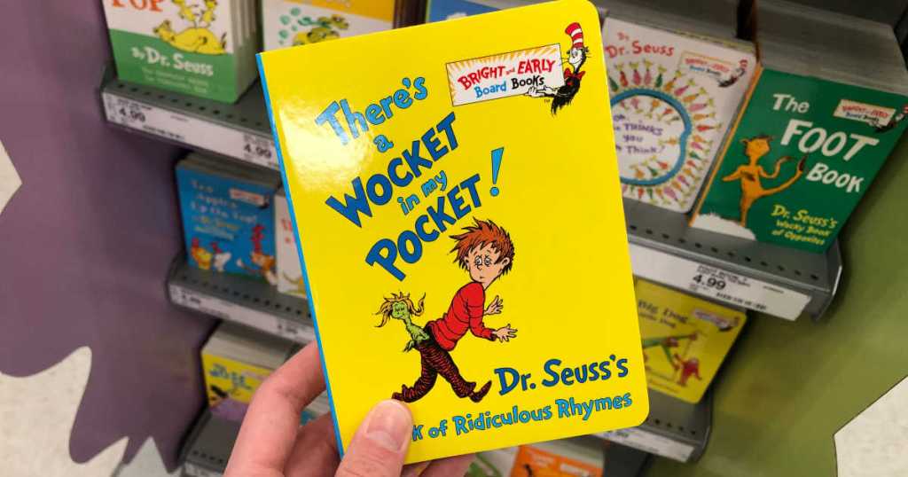 hand holding There's a Wocket in my Pocket board book in store