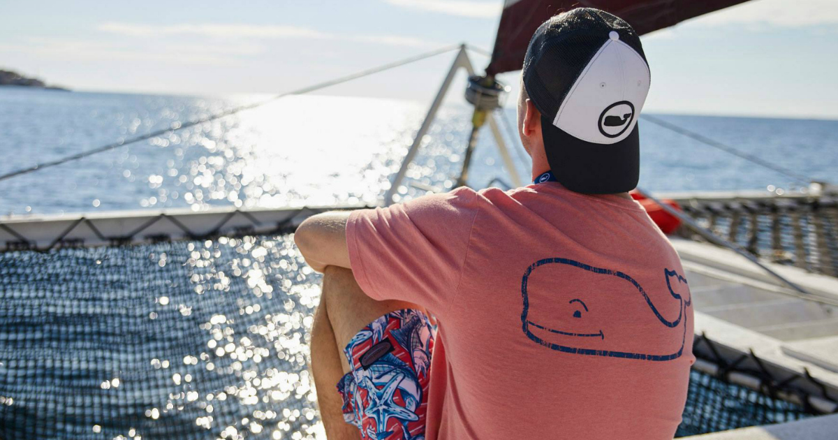 man wearing vineyard vines on a boat