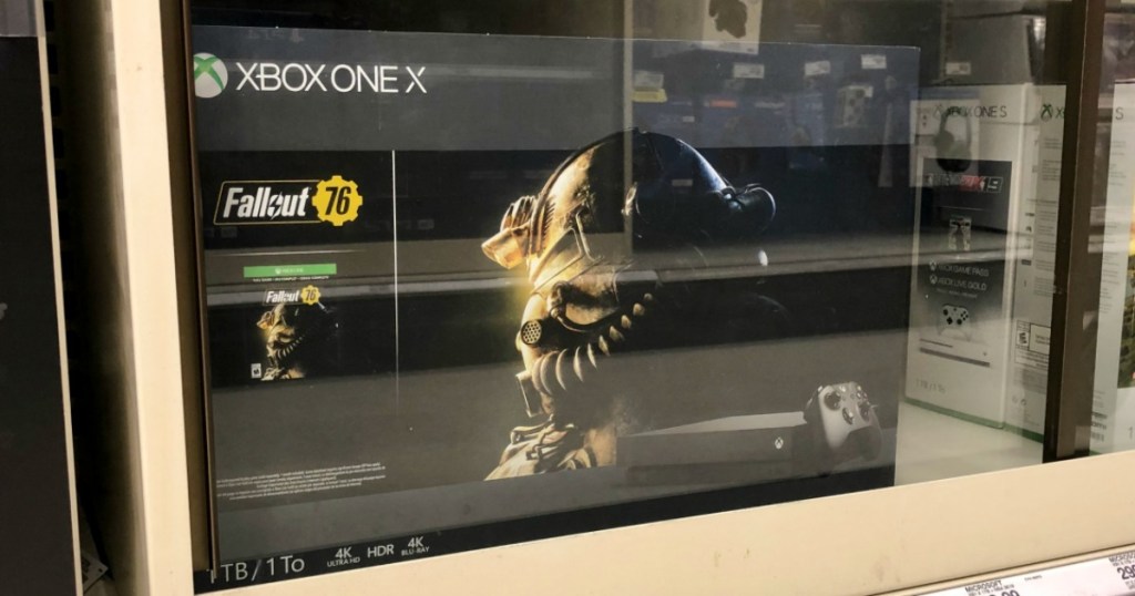 xbox one x in cabinet at store