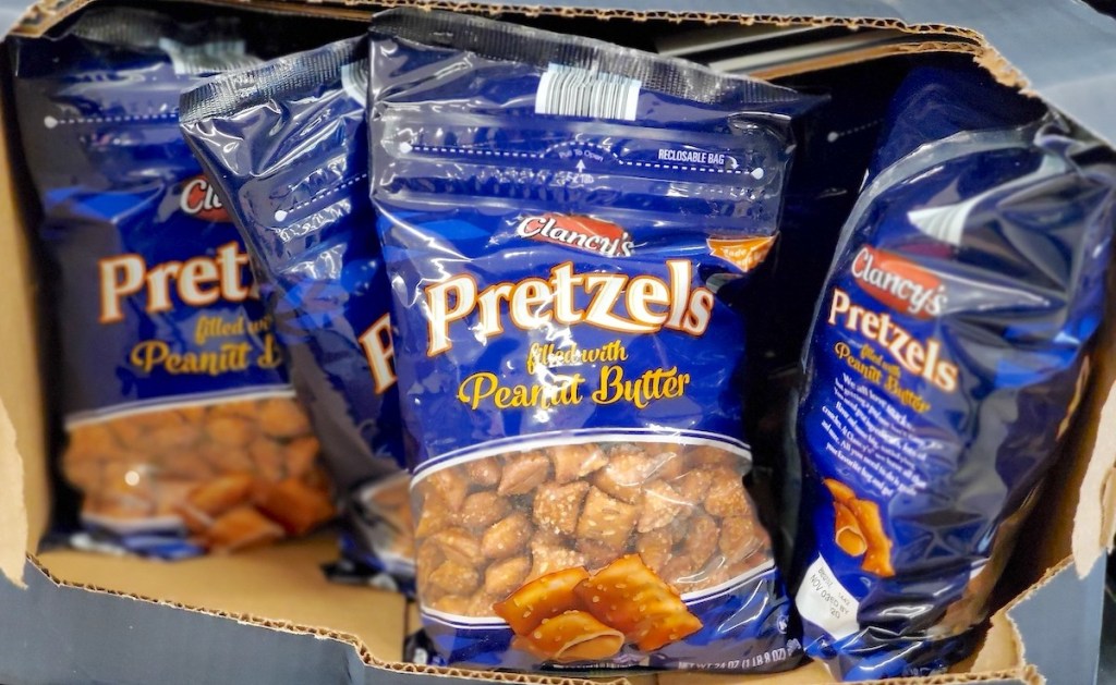 blue bags of peanut butter filled pretzels in cardboard box