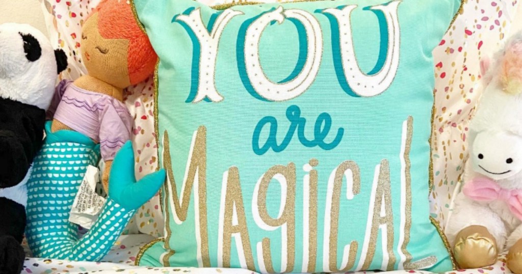 You are magical throw pillow on bed with other kids pillows