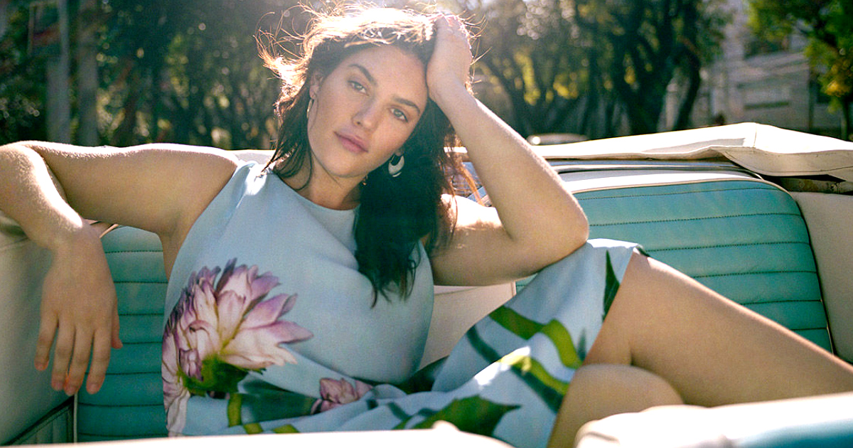 Brunette woman wearing the APlus by Anthropologie line