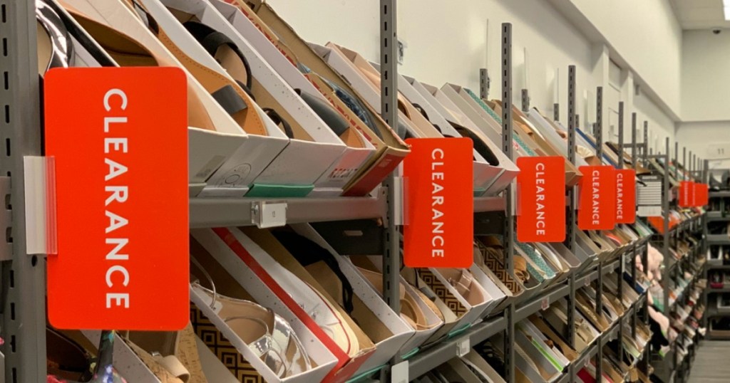 row of shoes boxes on shelves at Nordstrom Rack