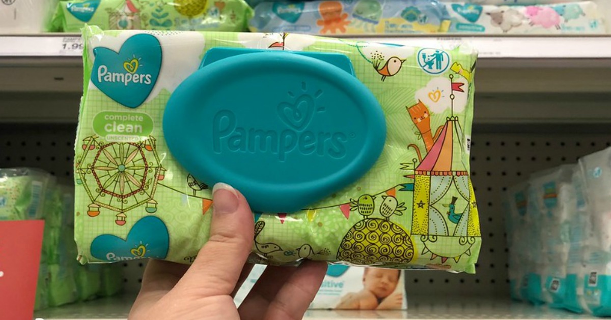 woman holding a pack of baby wipes