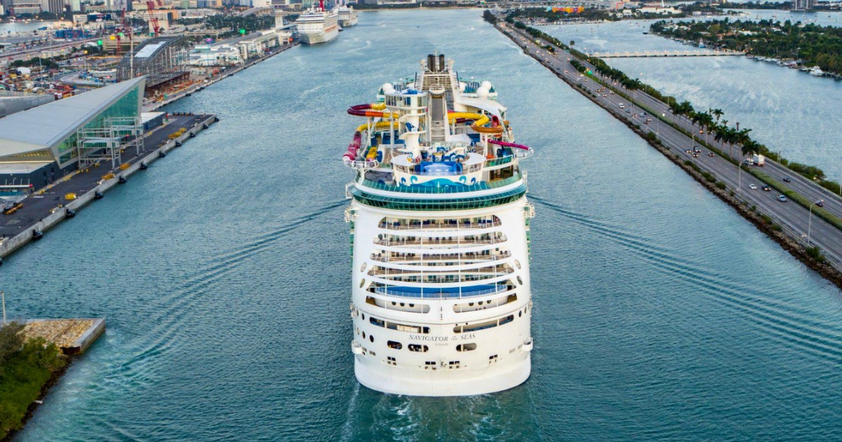 cruise ship leaving a harbor