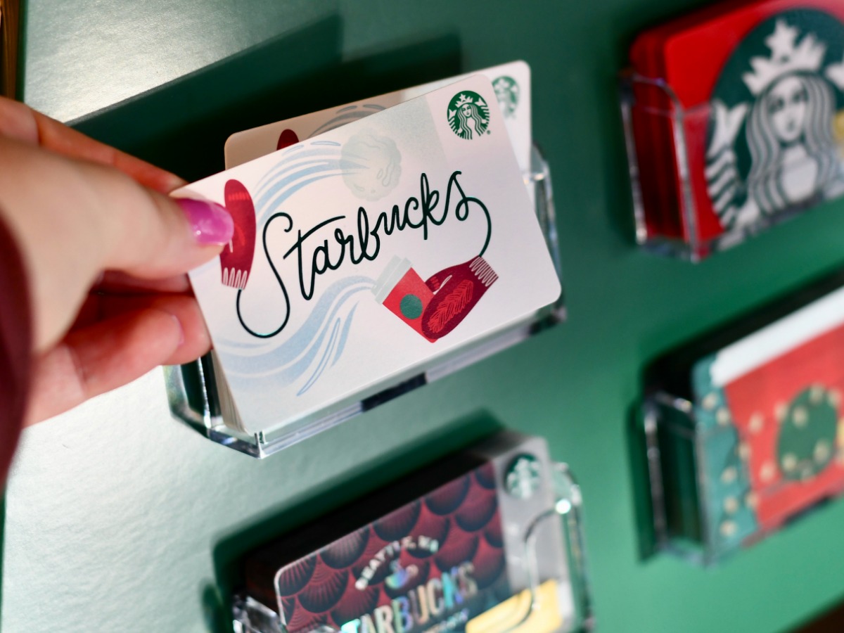 woman taking Starbucks Gift Card