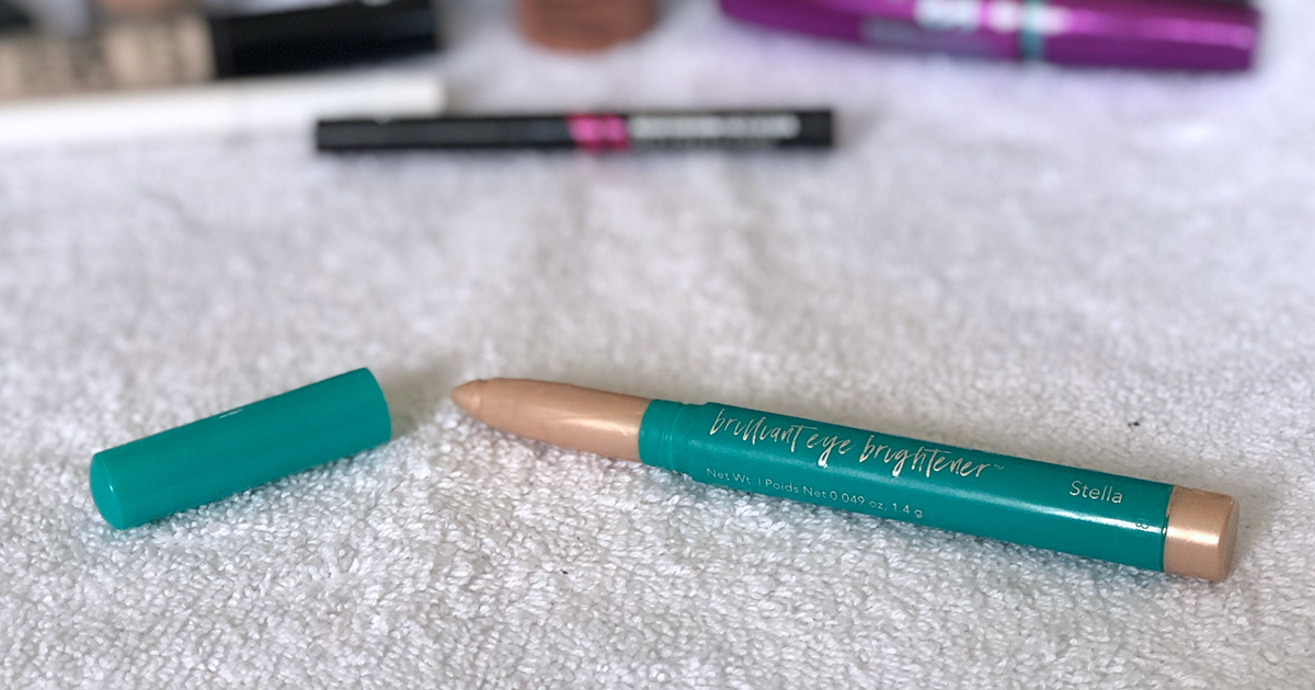 emily's makeup bag — thrive causemetics eye brightener highlighter stick