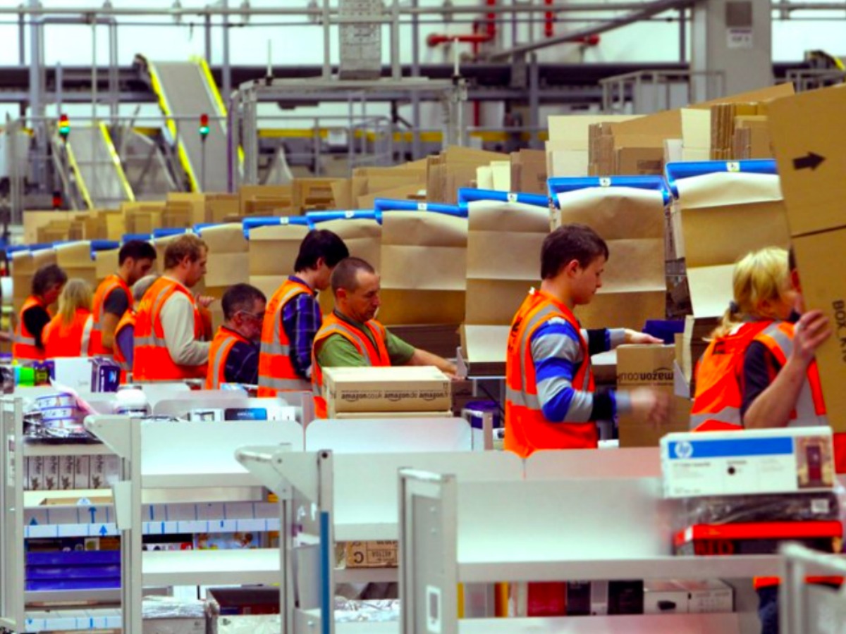 Amazon workers in an Amazon plant