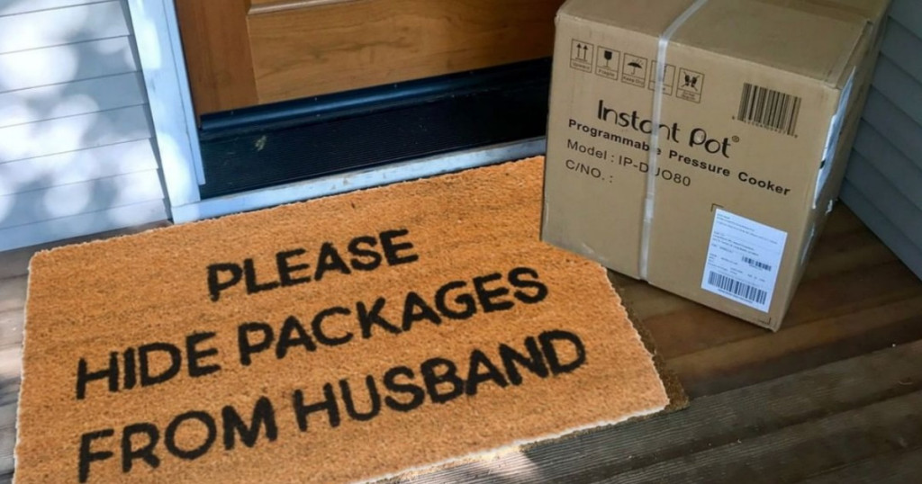 Doormat that reads "Please hide packages from husband"