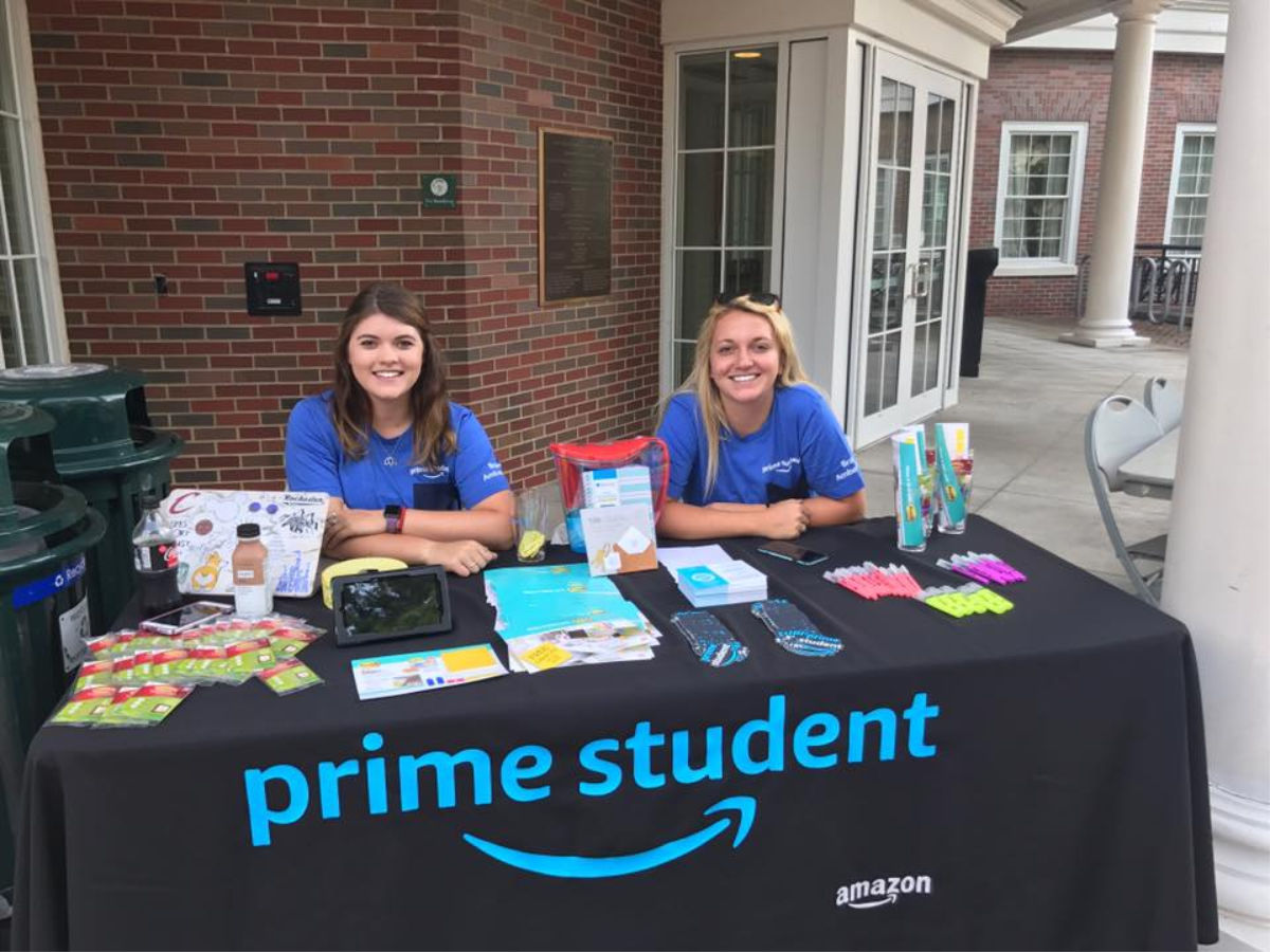 amazon student table with 2 girls sitting behind it