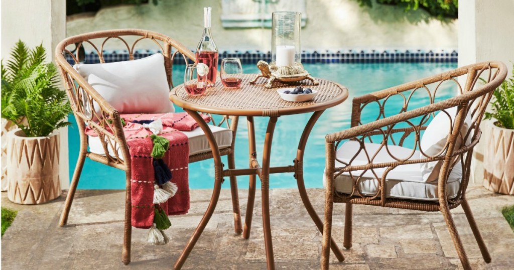 chair and table set next to pool