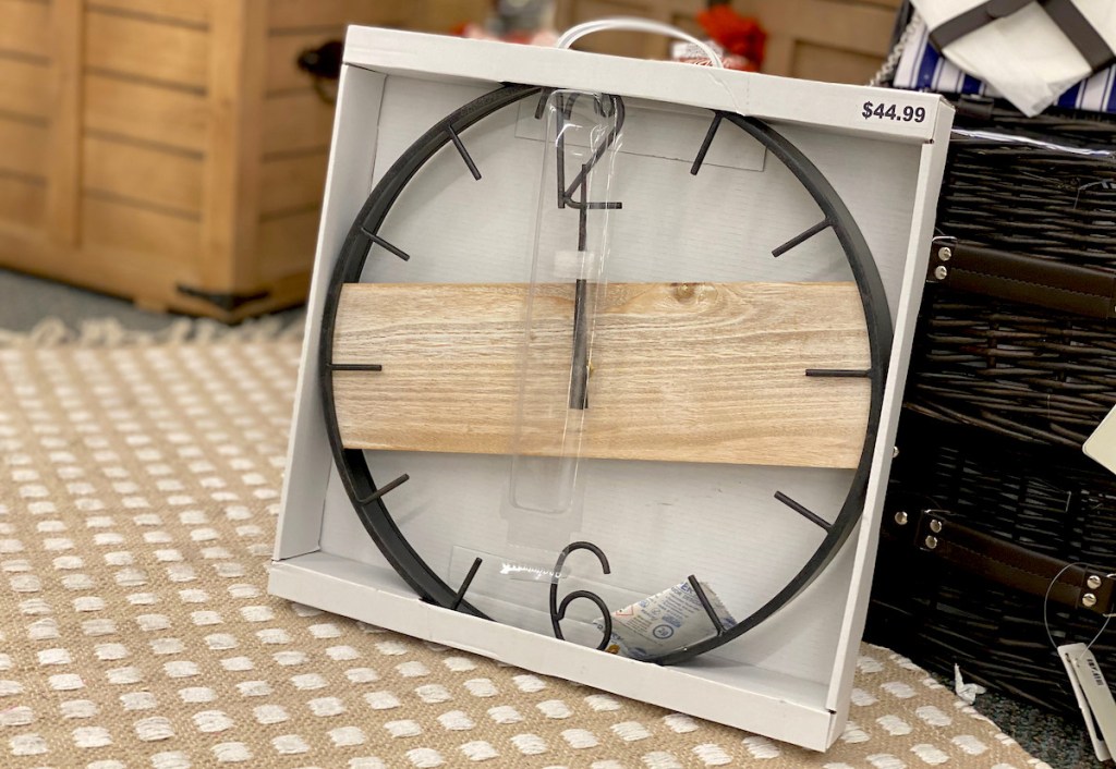 wall clock sitting on jute rug