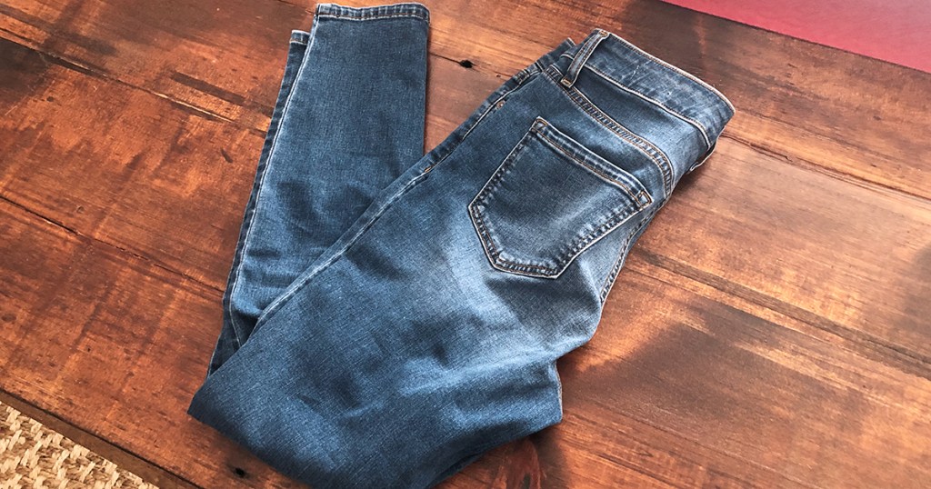 released hem denim diy — jeans at the beginning of the tutorial