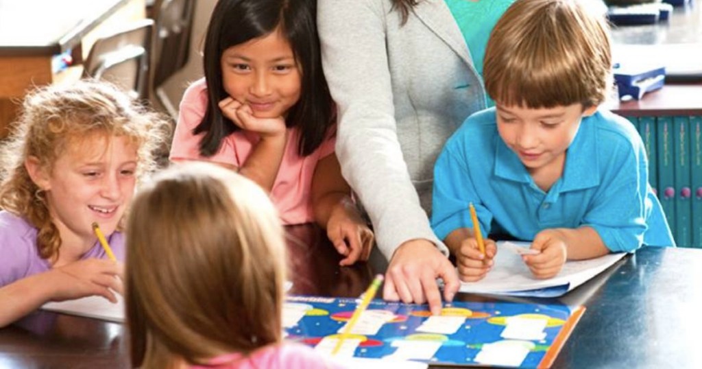 teacher and kids in a classroom