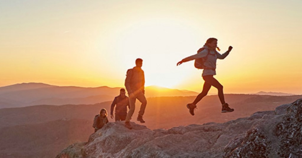 people climbing a mountain