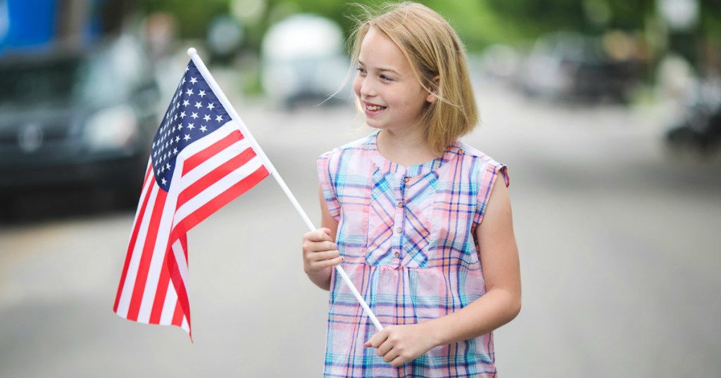 Piper holding American flag
