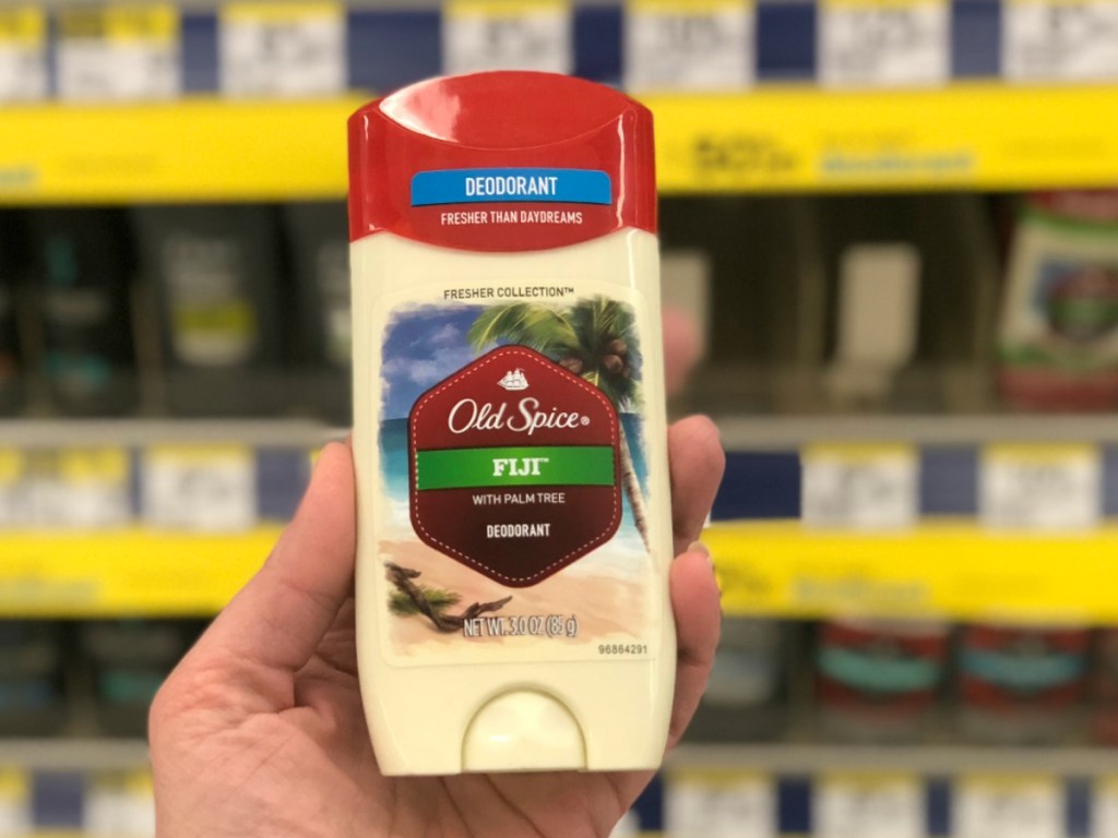 Woman's hand holding Old Spice Fiji Deodorant