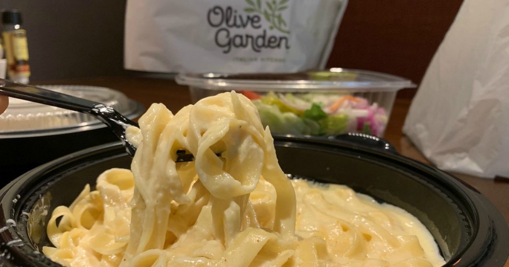Olive Garden pasta being eaten with fork