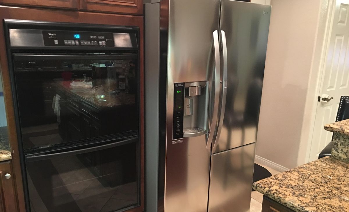 LG side-by-side refrigerator in a kitchen