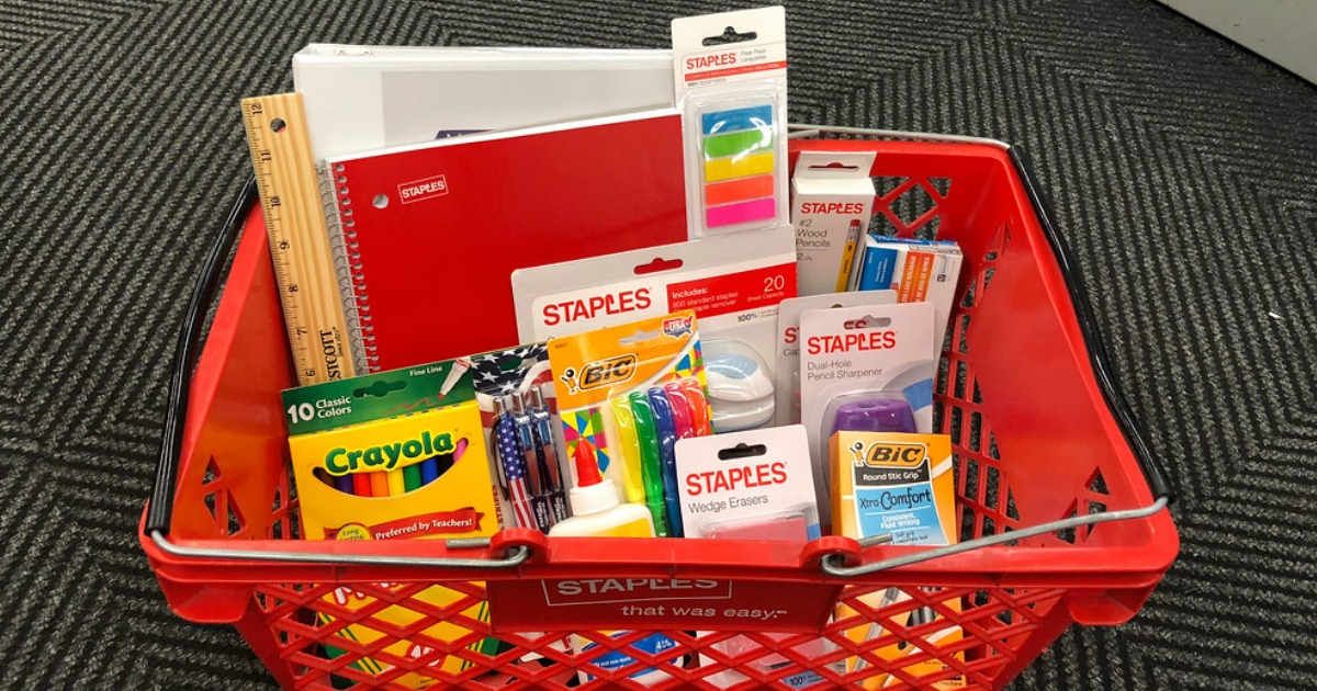 staples back to school supplies in a red staples basket on the floor