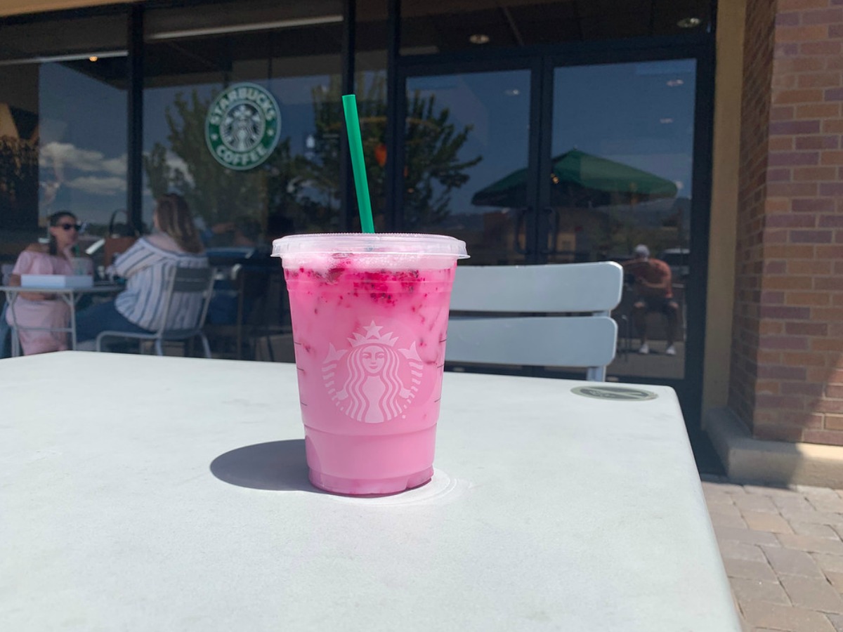starbucks dragon refresher in front of store on a table