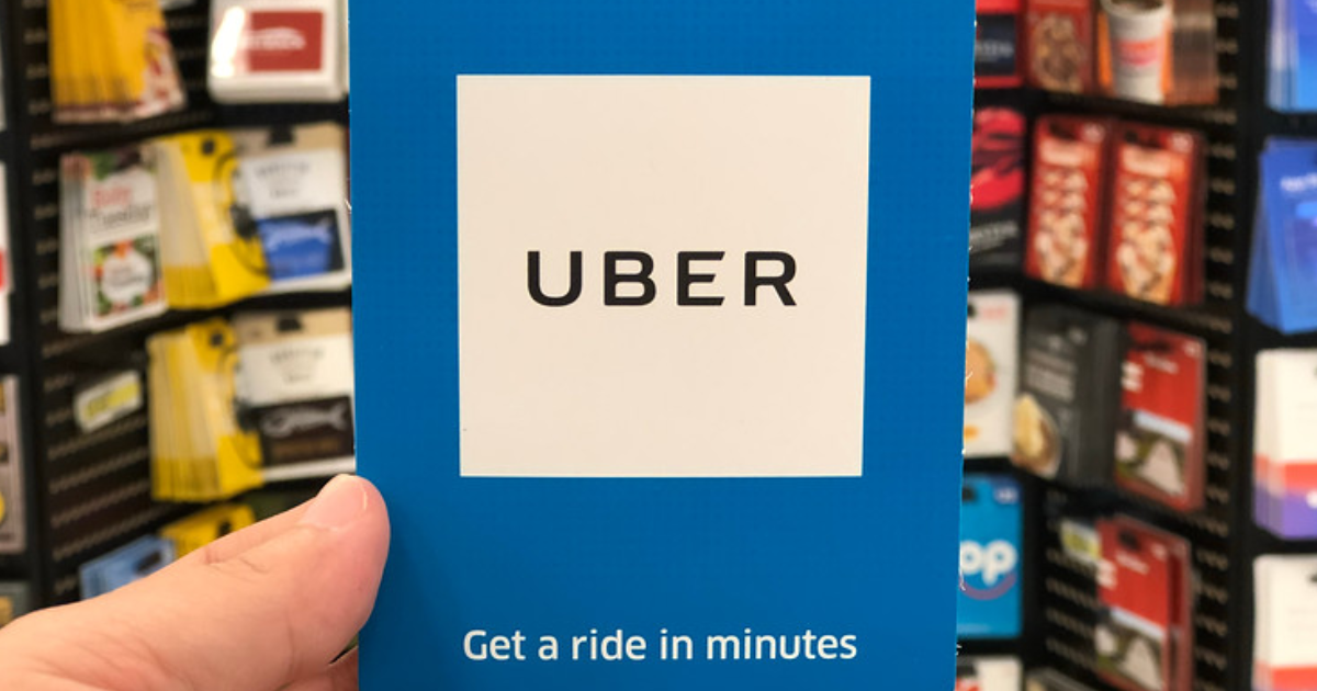 hand holding uber gift card