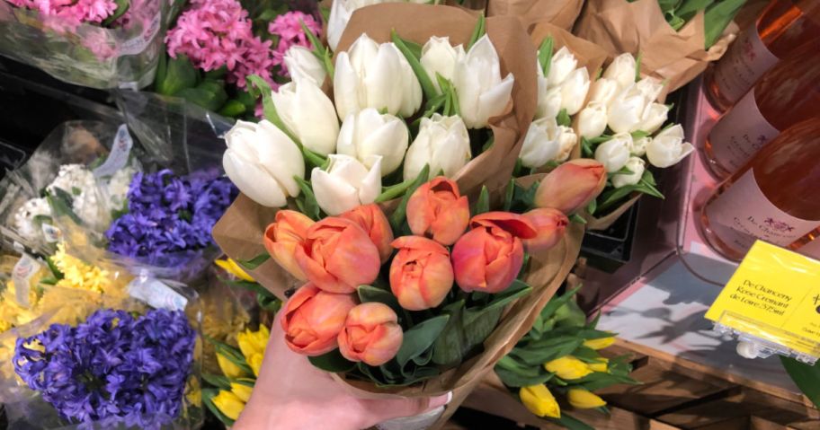 hold holding bouquets of tullips