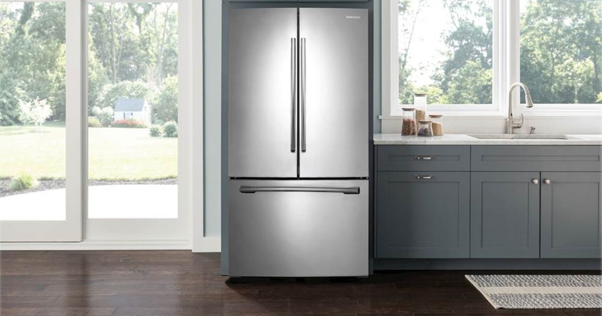 A stainless steel refrigerator in a kitchen