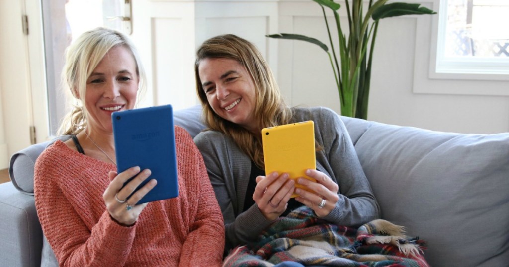 collin and bryn looking at kindle