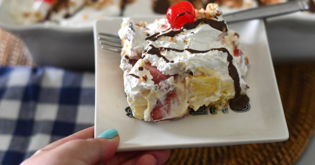 holding plate with banana split dessert slice 