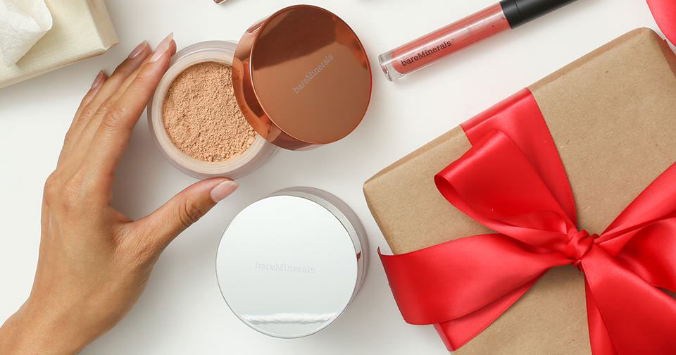 open bareMinerals powder plus a package with a red bow