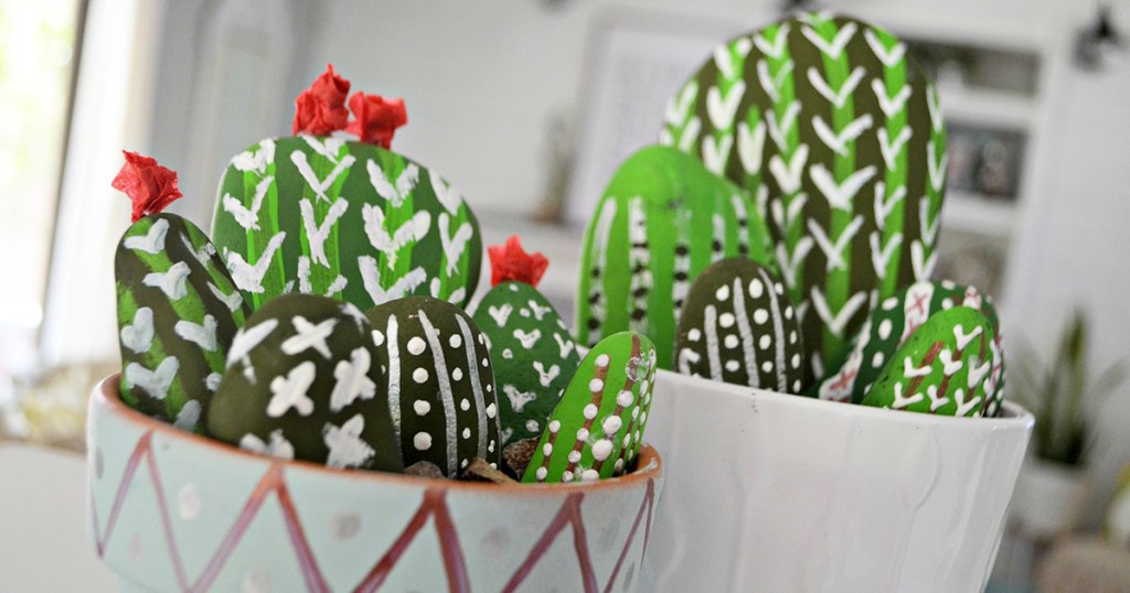 painted cactus rocks in planter pots
