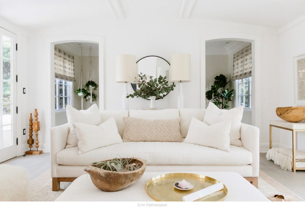 white living room with couch lamps