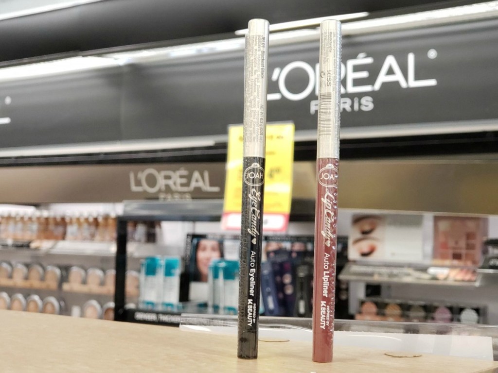 eye liner and lip liner on shelf 