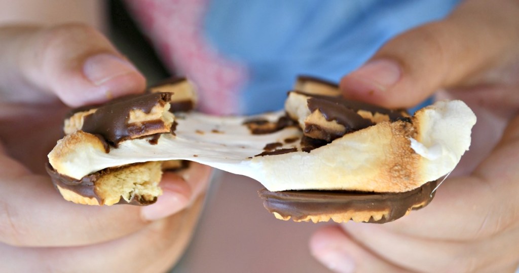 pulling a melted s'mores apart