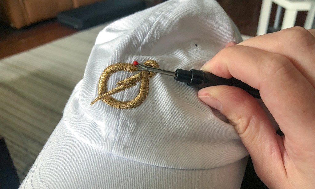 removing embroidery from baseball hat