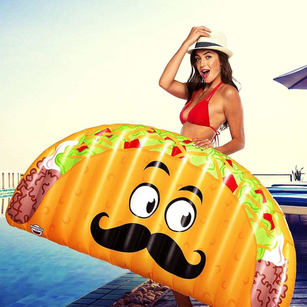 holding taco pool float