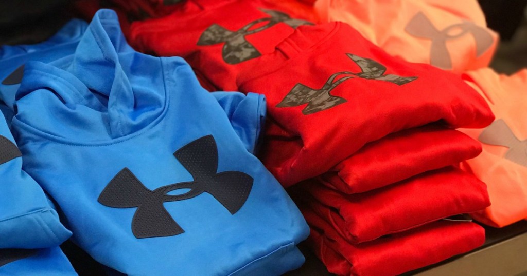 red and blue under armour hoodies folded