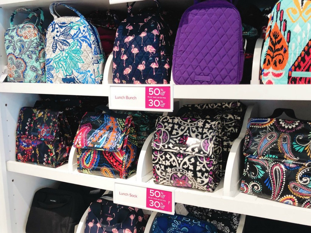 Vera Bradley lunch bags on a shelf at the store