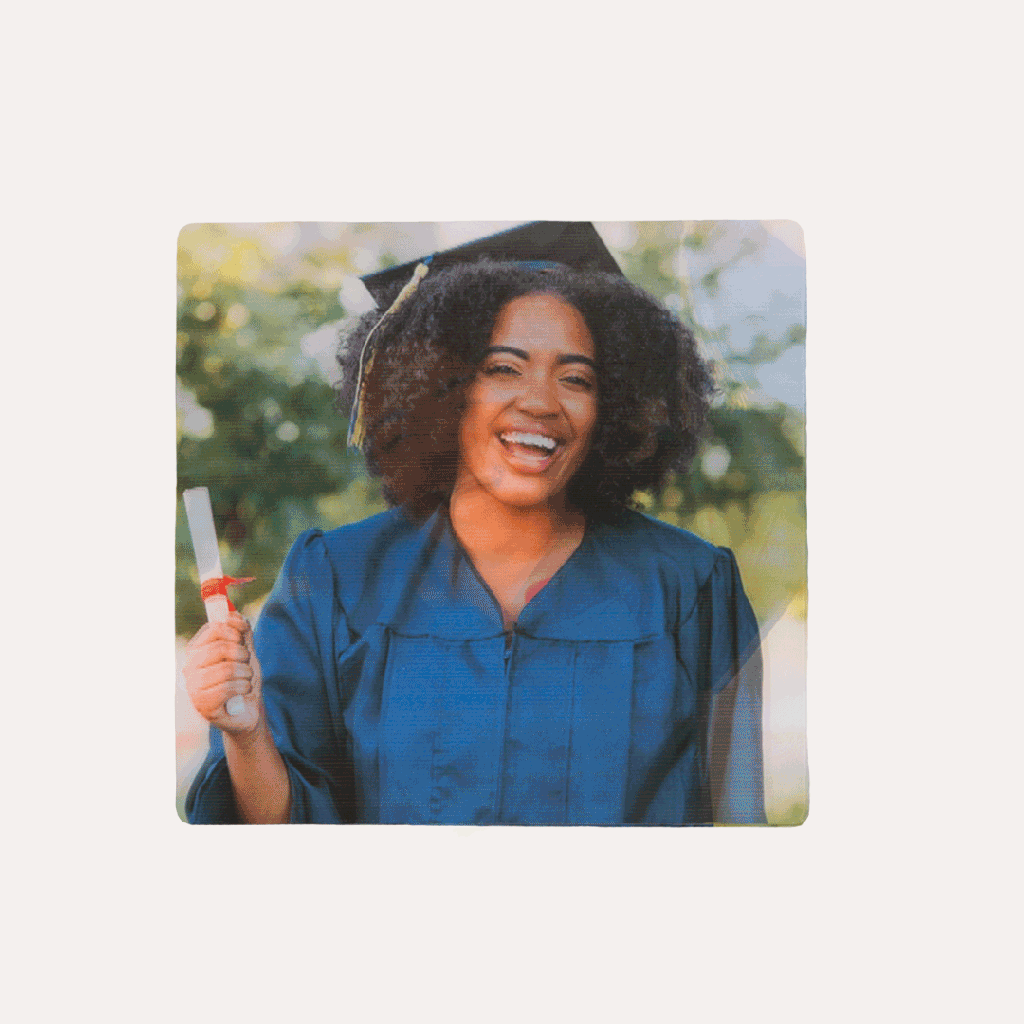 moving photo featuring graduate taking off hat