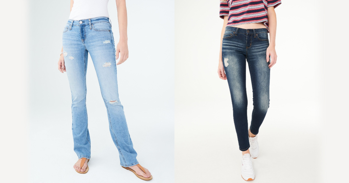 two women wearing distressed jeans