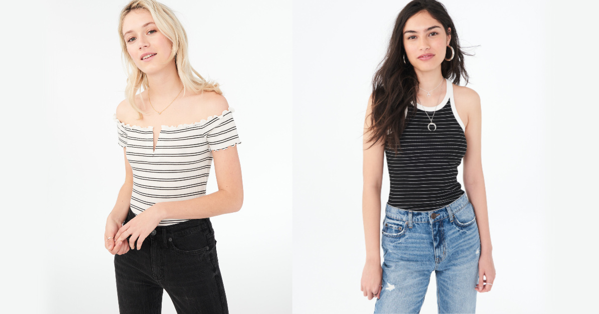 women wearing an off-shoulder white & black striped shirt and woman wearing black striped tank top