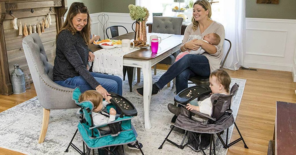 two moms with their children in dining room with portable chairs