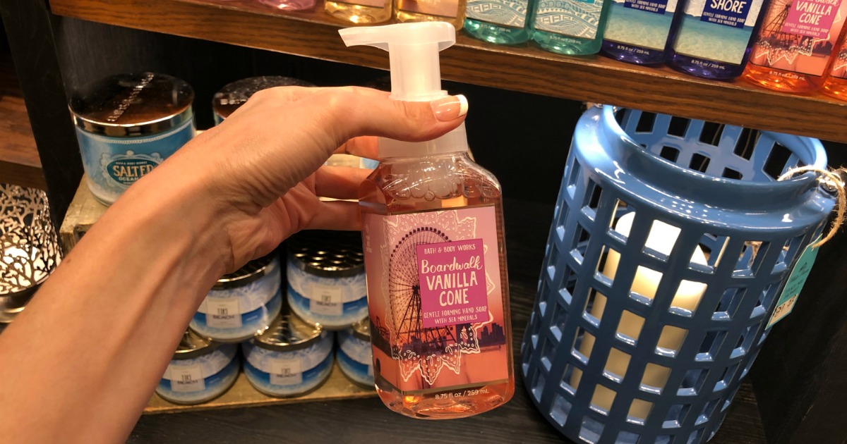 Woman holding Bath & Body Works Boardwalk Vanilla Cone Hand Soap