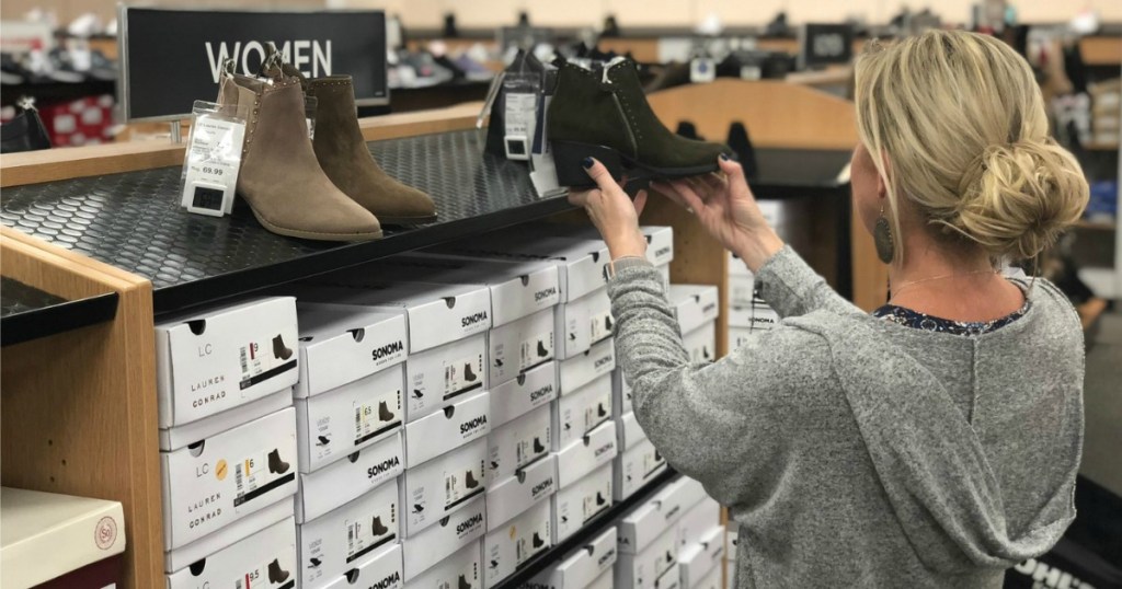 Collin looking at Sonima boots at Kohl's