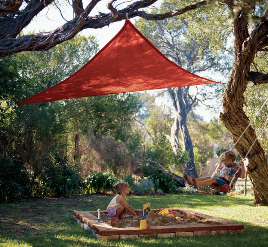 Coolaroo Shade Sail above kids in sandbox