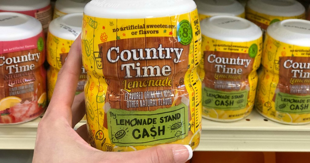 person holding Country Time lemonade