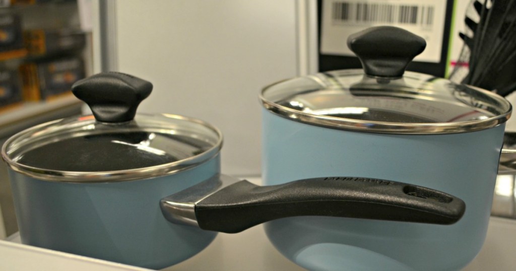 blue pots with lids on shelf